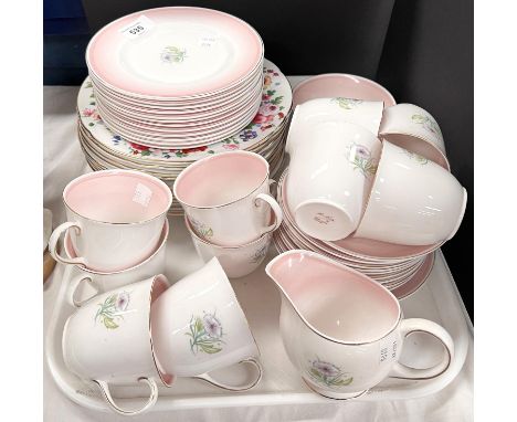 A Susie Cooper floral pattern art tea service, 34 pieces approx; a set of dessert plates with floral borders 