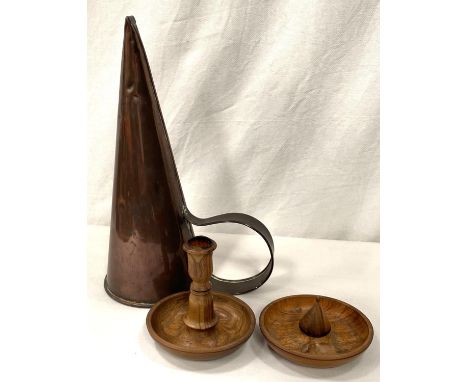 A hardwood "campaign" double candlestick in screw fitting box; a 19th century copper conical beer measure 