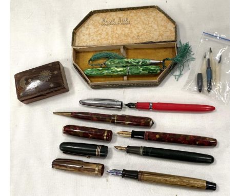 4 vintage fountain pens and a propelling pencil; an inlaid small box; a fountain pen &amp; pencil set in a box. 