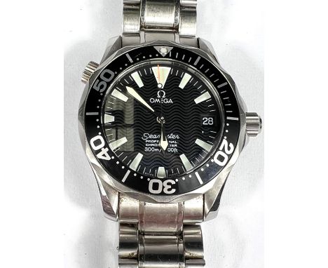 OMEGA: a circa 2000's Omega Seamaster professional chronometer with black wave dial and black bezel baton markers on an origi