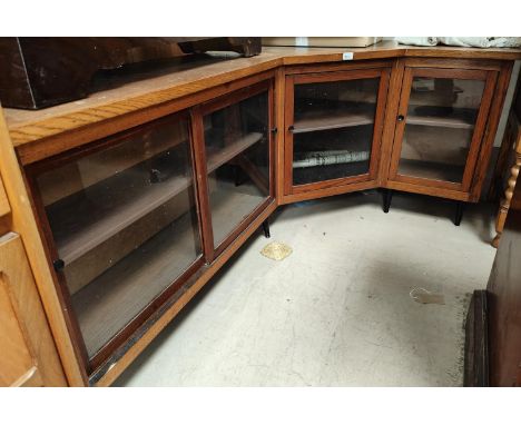 A modern light oak bookcase with shelves over 2 drawers, height 122cm, length 66cm; a mid 20th century oak corner display / b