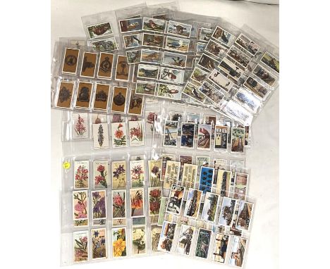 A selection of cigarette cards:&nbsp; South African wildflowers, 25; Australia&nbsp; wildflower 50; railway equipment 50; Bri