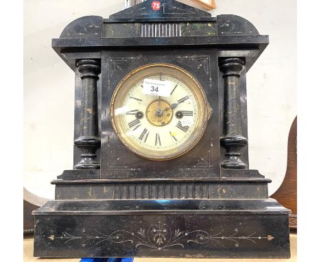 A 19th century mantel clock in architectural ebonised and marble effect case, with American striking movement, height 37cm; 2