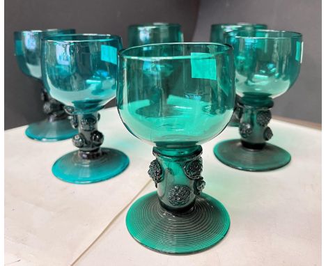 A set of four late Georgian Bristol green rummers, hollow stem, threaded foot and applied raspberry prunts on stem, ht 10.5cm