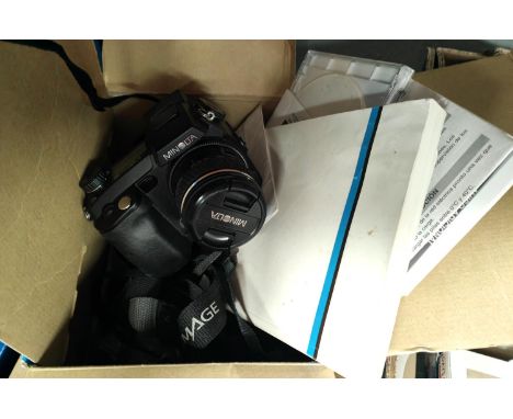 A boxed Minolta Dimage 7HI digital camera, strap, manuals, CD etc 
