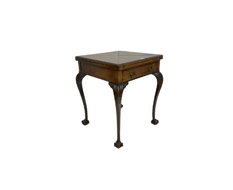 Early 20th century mahogany card table, the envelope top, opening to reveal baize lined top, over one frieze drawer, raised o