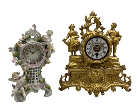 A late 19th century French gilt spelter mantle clock with an 8-day timepiece movement, decorative case with swags and standin