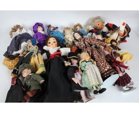 A large collection of 20th century dolls some bisque headed dolls together with various others to include a Arianna example&n