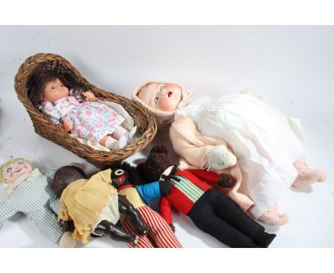 Large Armand Marseille bisque headed doll, with brown eyes, stamped to neck, together with two other dolls, a Chad Valley Rob