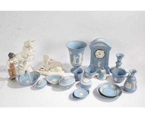 Large collection of Wedgwood blue jasperware to include mantle clock, candlestick, cups etc together with a Nao figure two pa