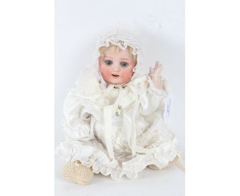 Heubach Koppelsdorf bisque headed doll, with sleeping blue eyes, 30cm long