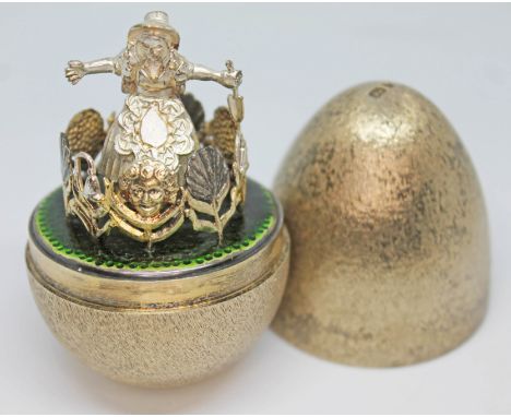 A Stuart Devlin silver gilt surprise egg Mary Mary Quite Contrary, London 1978, with box.  