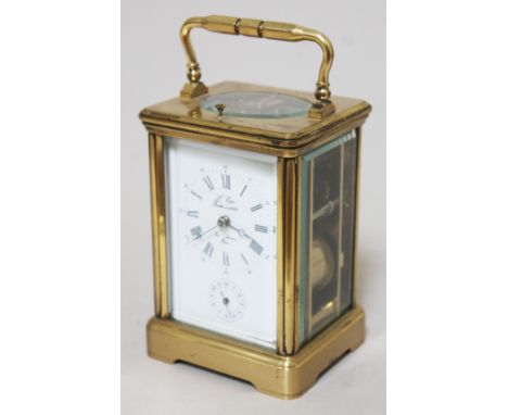 A French gilt brass repeating carriage clock, the dial signed L'Eppe, height 17cm. 