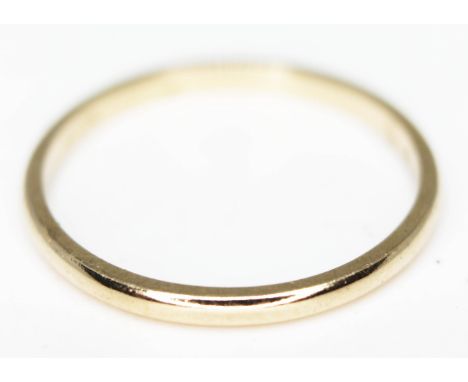 A 14ct gold wedding band, wt. 1.2g, size M.  