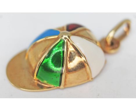 A hallmarked 9ct gold and enamel pendant/charm formed as a jockey's cap, gross wt. 1.3g.  