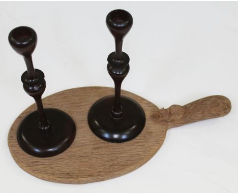 A Robert "Mouseman" Thompson of Kilburn English oak cheese board with carved mouse signature to handle, length 38cm, together