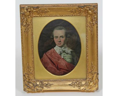 19th century school, mid length portrait depicting a gentlemen, oil on oval metal panel, paper label verso with family crest 