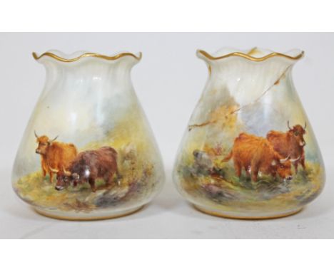 A pair of Royal Worcester porcelain vases, each decorated with cattle and signed H Stinton, both numbered G957, height 8cm.  