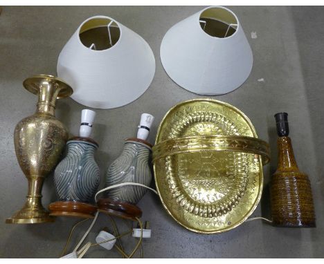 A pair of lamps with shades, one other lamp, a brass vase and a newspaper tray **PLEASE NOTE THIS LOT IS NOT ELIGIBLE FOR POS