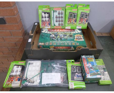 A box of Subbuteo; a game, seven team sets and accessories 