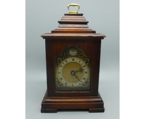 A small mantel clock, the movement marked Davall England, 19cm 