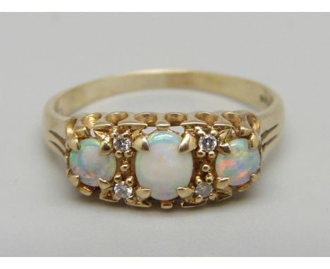 A 9ct gold, opal and diamond ring, 1.9g, M 