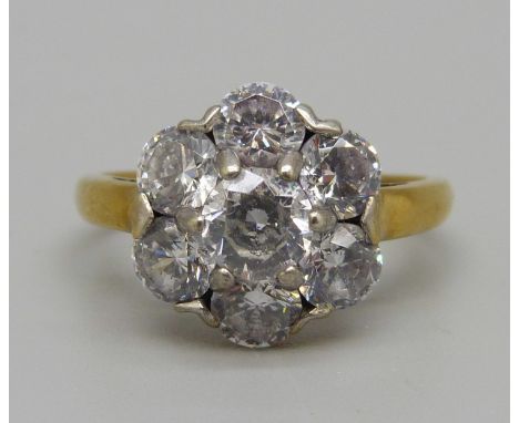 A silver gilt and CZ cluster ring, T 