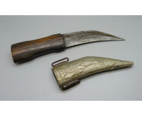 A Middle Eastern dagger with hardwood handle and scabbard, with inscription on the blade, 22cm 