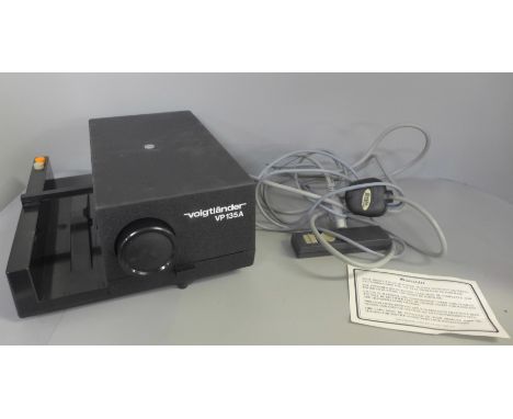 A Voigtlander slide projector, boxed 