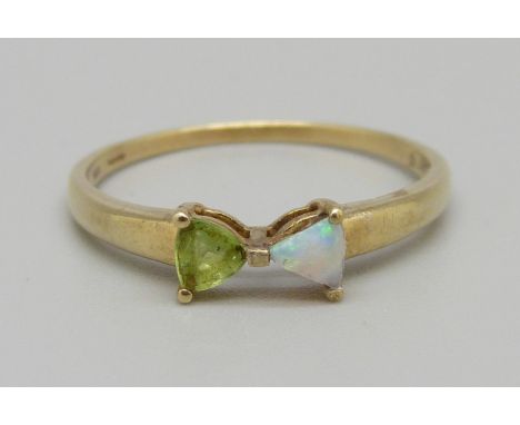 A 9ct gold, opal and peridot ring, 1.6g, U, (opal stone a replacement) 