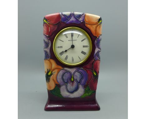 A Moorcroft Pansy pattern clock, 15.5cm 