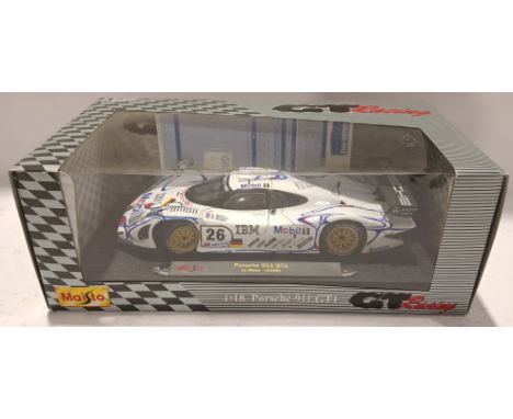 Maisto, a boxed and Signed 1:18 Scale Porsche 911 GT1 Le Mans (1998) Signed by Allan McNish (No COA). Original Invoice has be