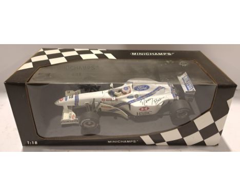 Minichamps, a boxed and Signed 1:18 Scale 180970022 Stewart Ford SF1 R Barrichello Formular One Racing Car. Signed by R Barri