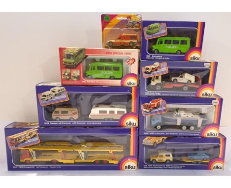 Siku, a boxed Group of 1:55 Scale Commercial Vehicles. Good to Excellent Condition within Good to Good Plus boxes. See Photo.