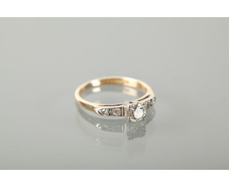 MID TWENTIETH CENTURY DIAMOND SOLITAIRE RING the brilliant cut stone of approximately 0.30 carats on diamond shoulders, marke