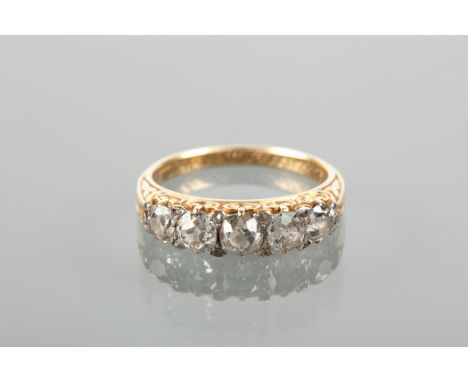 VICTORIAN DIAMOND FIVE STONE RING set with graduated old brilliant cut diamonds totalling approximately 1.30 carats, in a pie