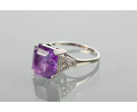 ART DECO AMETHYST AND DIAMOND RING set with a large octagonal amethyst 10x10.3mm, on tapered diamond shoulders, each set with