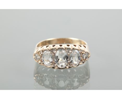 AQUAMARINE AND DIAMOND DRESS RING set with three oval aquamarines and two brilliant cut diamonds, in a boat shaped setting, u