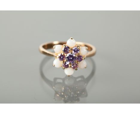 OPAL AND PINK GEM CLUSTER RING set with a cluster of pink gems surrounded by six cabochon opals, unmarked, size N