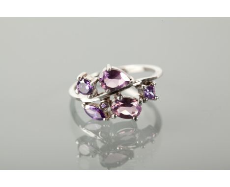 AMETHYST SET RING set with amethysts of various cuts, marked 925 for sterling silver, size T
