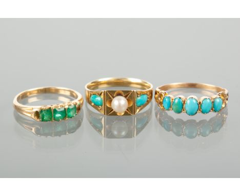 THREE VICTORIAN STYLE RINGS comprising one set with turquoise and a pearl, unmarked, size L; one set with emeralds, unmarked,