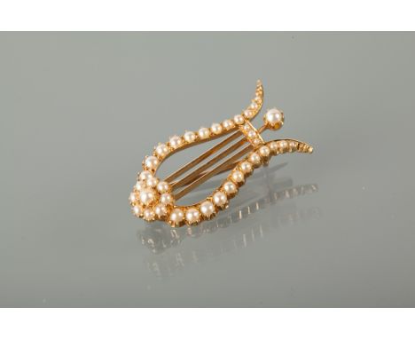 FINE EDWARDIAN PEARL SET HARP BROOCH of U-shaped form, set with split pearls, unmarked