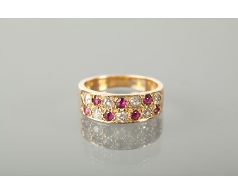 RUBY AND DIAMOND SET BAND with two rows of alternating diamonds and rubies, the diamonds totalling approximately 0.45 carats,