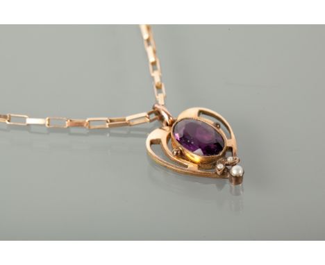 EDWARDIAN AMETHYST PENDANT set with a large oval amethyst 14mm long, within a sinuous openwork mount, on a later box link cha