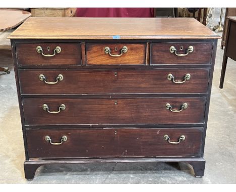 A George III mahogany chest of three short over three long drawers, raised on bracket feet. 45' wide x 37' high. Losses to ba