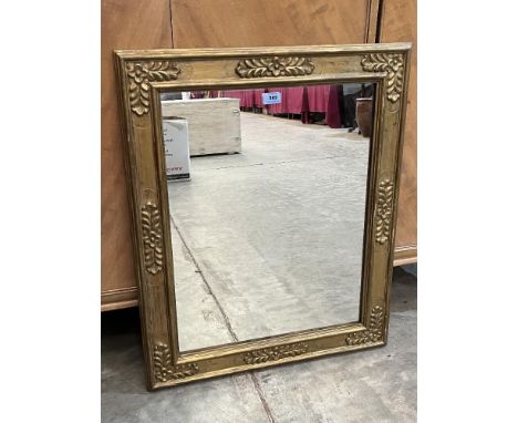 A Regency style gilt framed wall mirror. 29¾' x 24½'