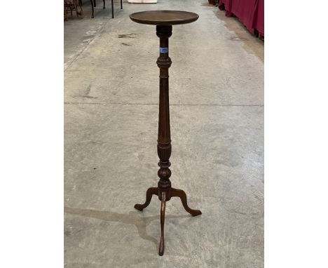 A mahogany torchere on tripod support 44½' high