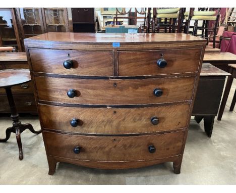 A George III mahogany bowfronted chest of two short over three long drawers on splayed bracket feet. 42' wide 