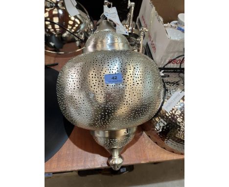 A Moroccan style steel hanging lamp. 20' high. Emporio Arts