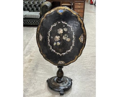 A Victorian papier-mache painted and mother-of-pearl inlaid snap-top table in the manner of Jennens and Bettridge. 27' wide. 